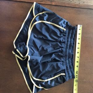 Black and Gold Super Squad Lululemon Shorts